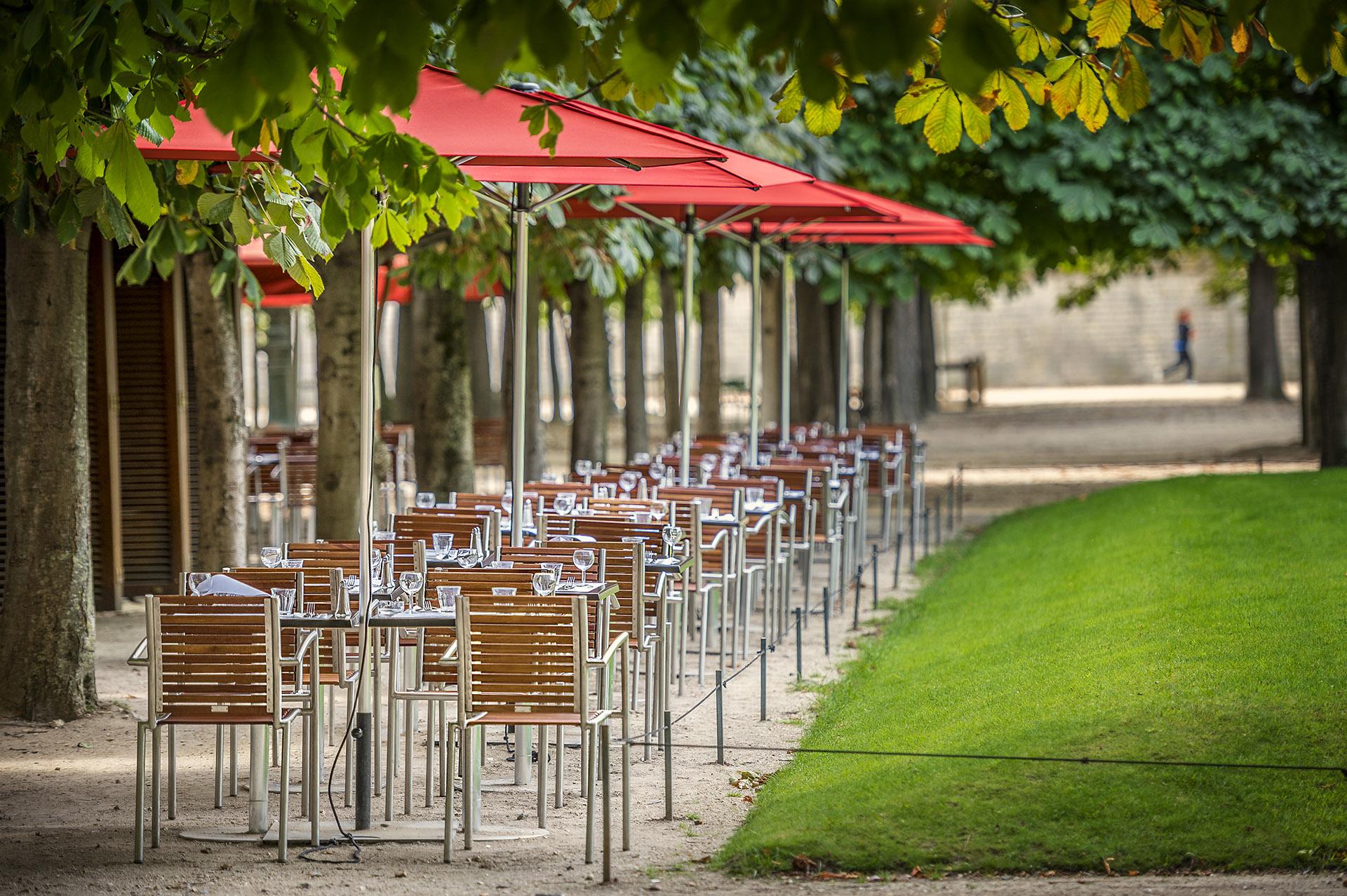 French restaurant – tables and chairs on the street – Paris, France